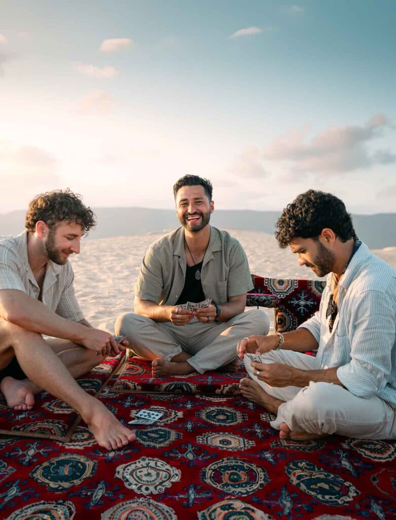 A woman in a tent in a scenic European landscape.