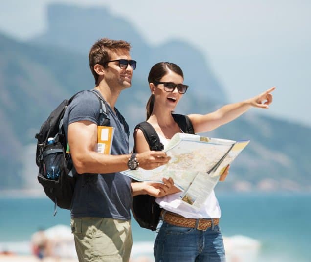 Couple looking at a map on a trip