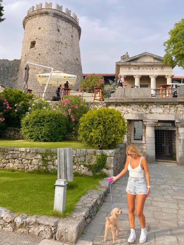 View of Cape Town from a mountain with a woman